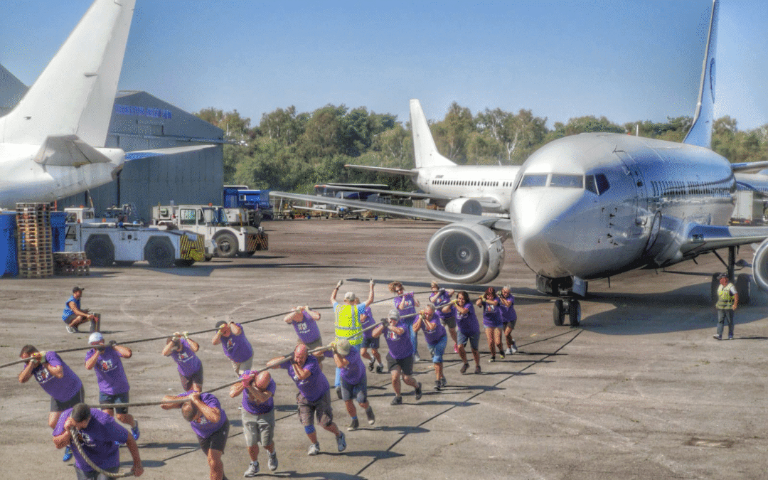 Could you pull a plane and raise much-needed funds to support local families?